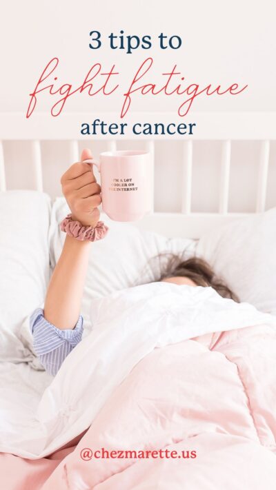 Woman in bed raising a mug